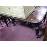 William IV Mahogany Extending Dining Table, on turned and reeded legs (damage to top).