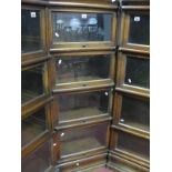 An Early XX Century Oak Four High Sectional Corner Bookcase.