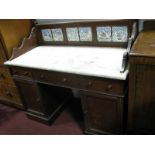 A XIX Century Mahogany Washstand, with a three-quarter galley back, grey marble top, central