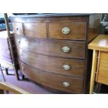 An Early XIX Century Mahogany Bow Fronted Chest of Drawers, with three small and three long drawers,