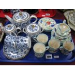 A Gray's Pottery Part Coffee Service, painted in green, iron red and blue with stylised tulips and