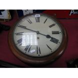 A Late XIX Century Mahogany Cased Circular Wall Clock, the cream dial with black Roman numerals,