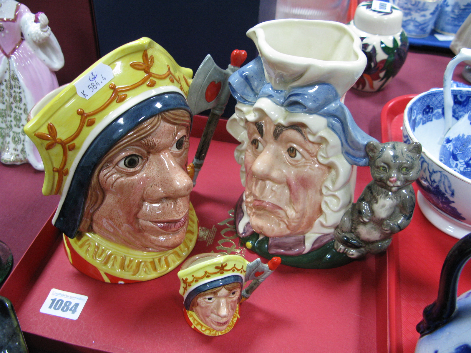 Royal Doulton Large Character Jug The Red Queen, D 6777, and a small one of the same, D6860;