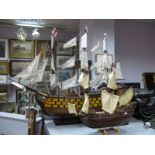 A Wooden Kit Built Model 'HMS Victory', mounted on a named stand, overall 82cm high, 100cm length,