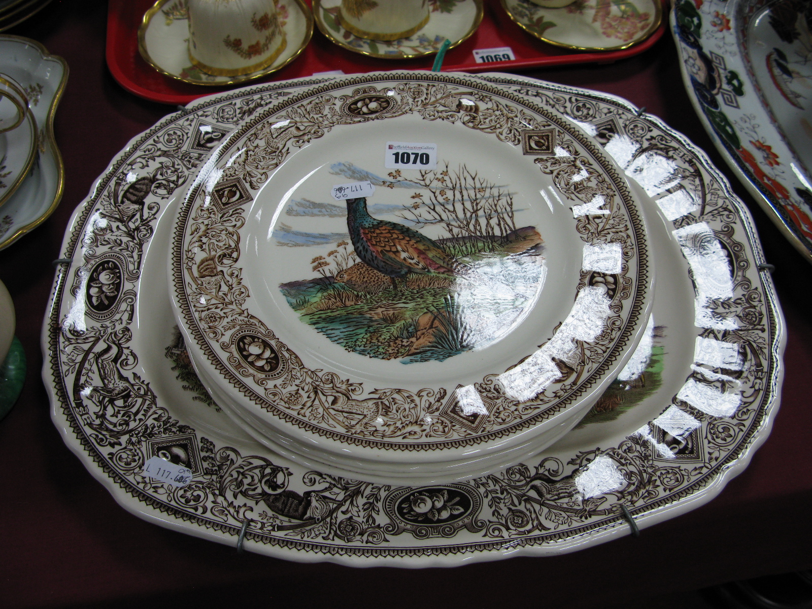 A Mason's Ironstone China Meat Dish and Six Dinner Plates, decorated in the 'Game Birds' pattern,