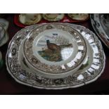 A Mason's Ironstone China Meat Dish and Six Dinner Plates, decorated in the 'Game Birds' pattern,