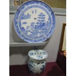 A Large Blue and White Willow Pattern Wall Charger, circa 1900, 44.5cm wide, a later Chinese pottery