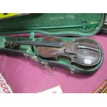 An Early XX Century Violin, with one piece back, no internal labels, no bow, length of back 36cm,