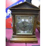 An Early XX Century Oak Westminster Chime Mantel Clock, pediment with dentil frieze, silver