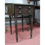 An Early XIX Century Mahogany Work Table, the top with drop leaves, moulded edge, single fitted