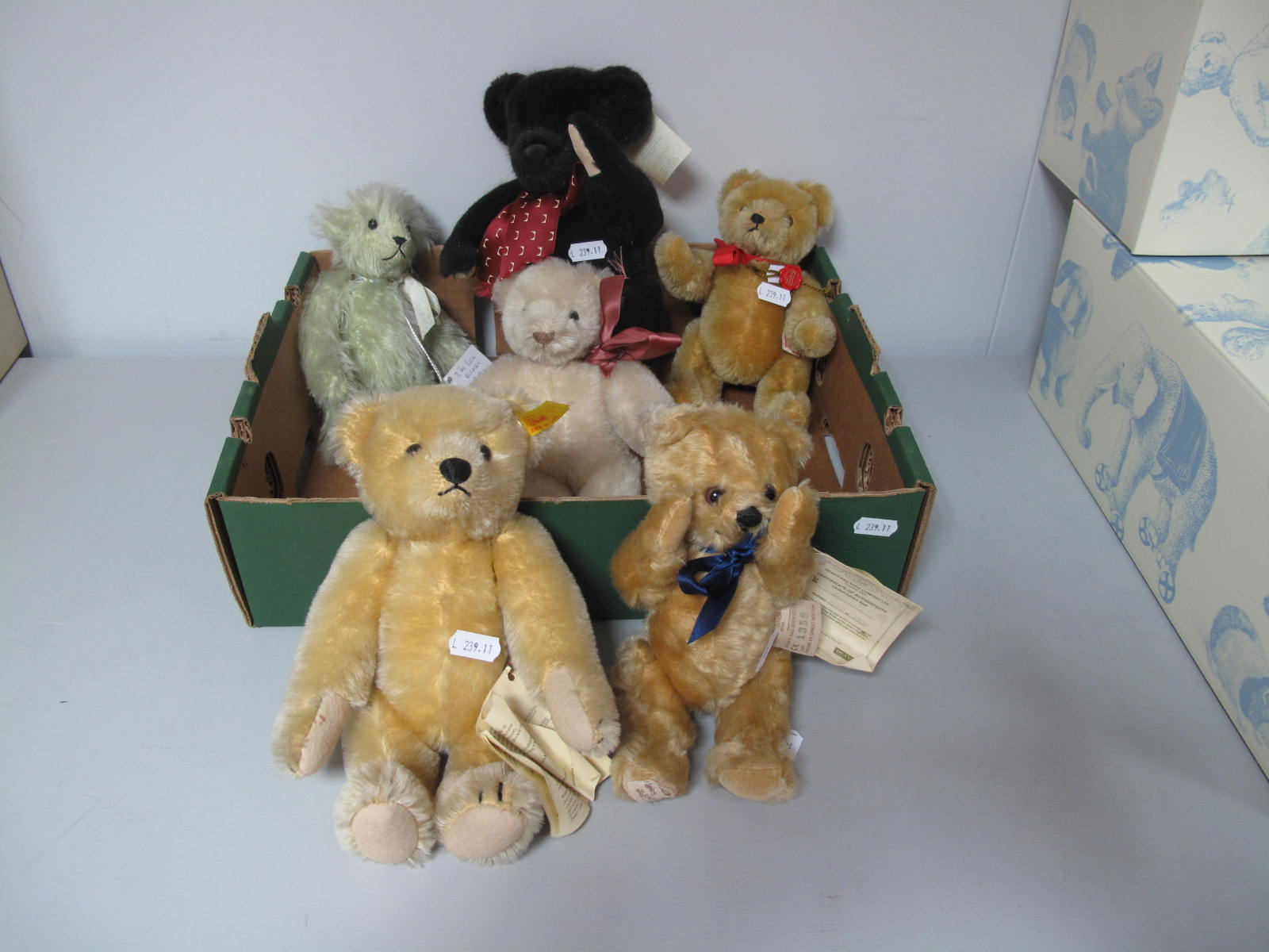 Six Jointed Modern Teddy Bears, between 8 and 10inches high approximately. Including a Steiff 1909