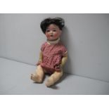 An Early XX Century Heubach 20" High Mold 320 Bisque Headed Doll, blue sleepy eyes, dark brown