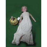 An Early XX Century German Shoulder Bisque Head Doll, 18" high, blonde wig, leather body, bisque