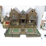 An Usual and Well Made Early to Mid XX Century Dolls House, in the form of a gentleman's villa, made