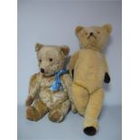 Two Mid XX Century Well loved Jointed Teddy Bears, Chiltern Teddy with blue bow and bell 18" high