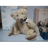 A Modern Jointed Teddy Bear From 'Pawtrait Bears' approximately 27" tall, wearing a navy and white