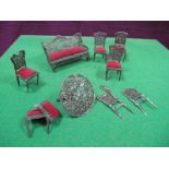 A Small Quantity of Fine Fret Work Metal Dolls House Furniture, made up of settee, six chairs and