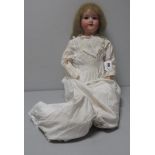A Bisque Headed German Doll, by Armand Marseille, stamped 390/A6M. Sleepy eyes, open mouth and