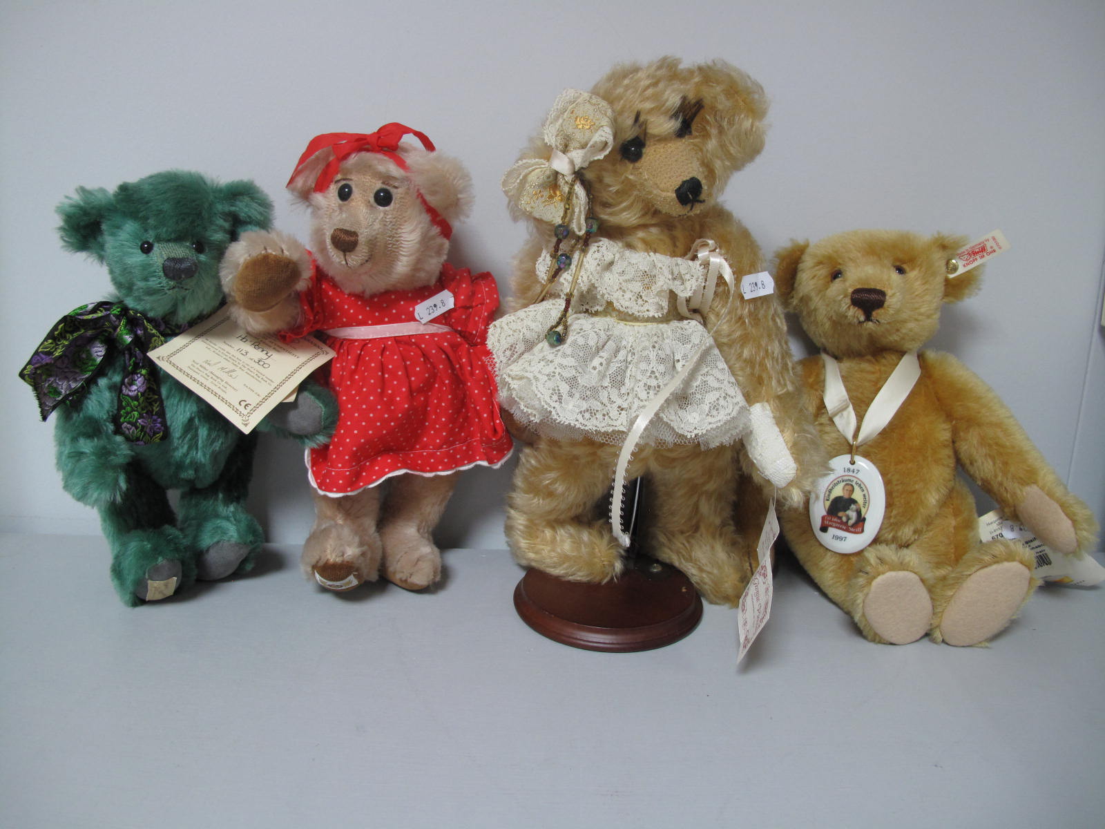 Four Modern Classic Teddy Bears, including one Steiff blond mohair jointed Teddy with squeaker and