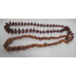 A Raw Amber Necklace, of graduated design; together with another necklace of graduated design. (2)