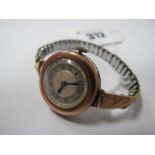 A 9ct Gold Cased Ladies Wristwatch, the engine turned dial with Arabic numerals on later expanding