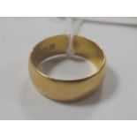 A Plain Wide Wedding Band, (indistinctly incomplete hallmark).