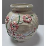 Maling Pottery Globular Vase, with floral decoration on ribbed pearl lustre ground, 16.5cm high.