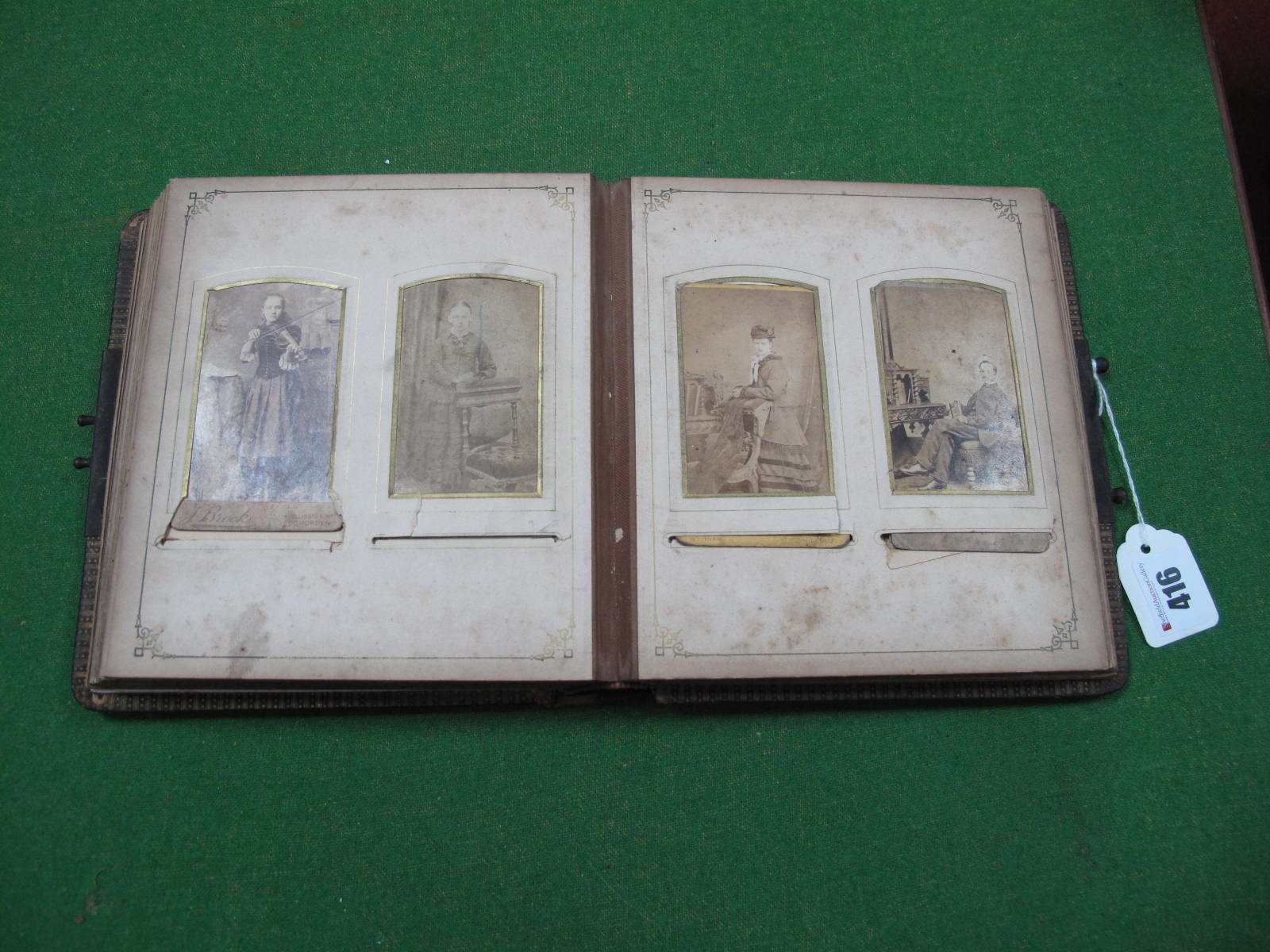 A XIX Century Leather Backed Photo Album, containing period images.