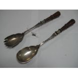 A Pair of Hallmarked Silver Salad Servers, Mappin & Webb, Sheffield 1903, each with turned wood