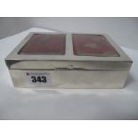 A Hallmarked Silver Playing Card Box, of plain rectangular form with twin glazed apertures to the