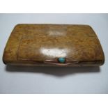 A Rectangular Wooden Snuff Box, the applied thumb piece indistinctly stamped, set with oval cabochon