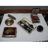 A Souvenir Cigarette Case, powder compact, 'Studs' pot, cheroot holder, Colibri lighter,