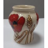 A Moorcroft First Quality Harvest Poppy Vase, by Emma Bossons, shape 146/3, 8.5cm high.