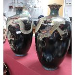 A Pair of Chinese Cloisonne Vases, of ovoid form, each featuring sinuous dragon on black ground,