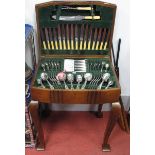 A Walnut Table Canteen of Cutlery, circa 1930's containing approximately eight five pieces.