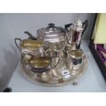 A Three Piece Plated Tea Set, a coffee set, circular slaver on ball and claw feet, etc.