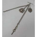 A Curb Link Albert Chain, suspending hallmarked silver medallion pendant and t-bar; together with