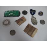 An Oval Silver Medallion, coins, banknotes.