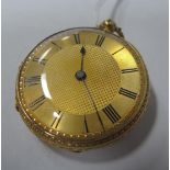 An 18ct Gold Cased Ladies Fob Watch, the engine turned dial with black Roman numerals, the