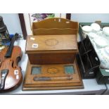 An Edwardian Oak Desk Tidy, fitted with slope front correspondence box, boxwood stringing and fan