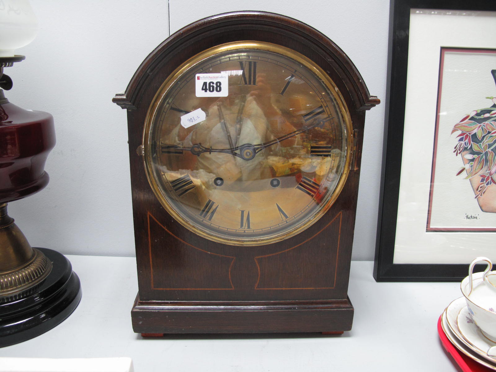 A Late XIX Century/Early XX Century Oak Cased Bracket Clock, with a domed top, brass dial, Roman