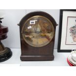 A Late XIX Century/Early XX Century Oak Cased Bracket Clock, with a domed top, brass dial, Roman