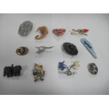 Vintage Costume Brooches, including heart enclosing picture of Shirley Temple, dogs, etc.