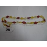 A Modern Amber Coloured Bead Necklace, to screw clasp