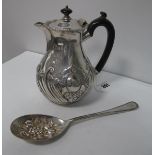 A Hallmarked Silver Lidded Jug, of baluster form detailed in relief, with gadrooned rim; together