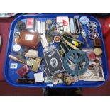 A Cheroot Holder, corkscrew, pocket knives, coins, pen, pencil, lighters, etc:- One Tray