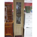 An Ash? Effect Display Cabinet, with a glazed door, three internal shelves, panelled cupboard door.