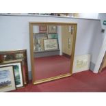 A Large Rectangular Bevelled Wall Mirror, in gilt frame, 128.5 x 100.5cm.