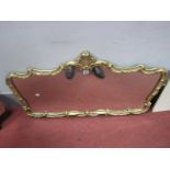 A Gilt Metal Framed Wall Mirror, with scrolled border.