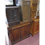 A Victorian Mahogany Bookcase Base, with flattened arched panelled doors below single frieze